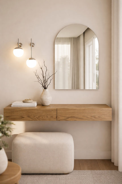 Arc de Triomphe mirror by Spiegel & More with a white aluminum frame, measuring 60x80 cm, elegantly placed above an entryway console table.